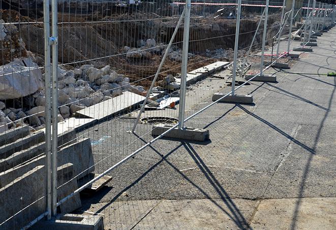 temporary fence panels set up to direct crowd flow at an event